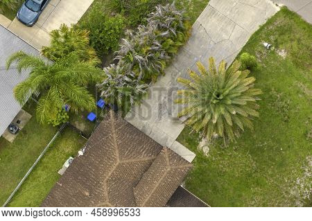 Aerial View Of Typical Contemporary American Private House With Roof Top Covered With Asphalt Shingl