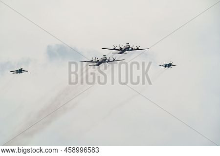 Russia, St. Petersburg, 28 July 2022: Military Aircraft And Helicopters Of The Air Force Fly On The 