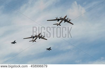 Russia, St. Petersburg, 28 July 2022: Military Aircraft And Helicopters Of The Air Force Fly On The 