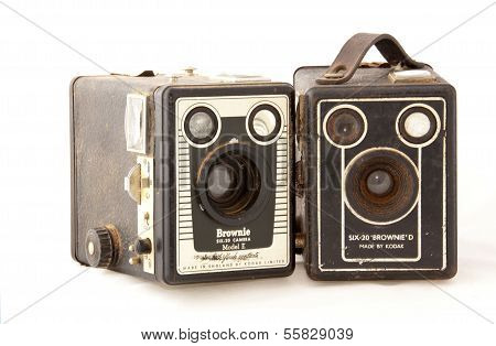 Two Isolated Vintage  Kodak Cameras On White Background