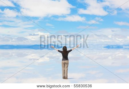 Woman with raised hands