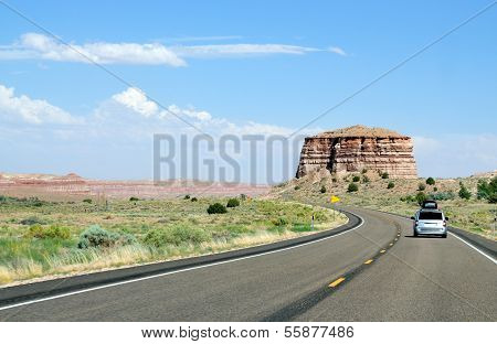 Mini Van In Route To Monument Valley