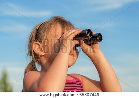 Little Girl Looking Through Binoculars