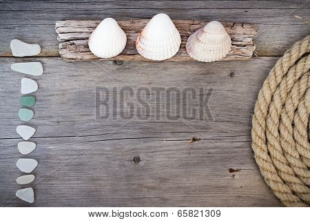 Marine background - seashells, rope and sea glasses