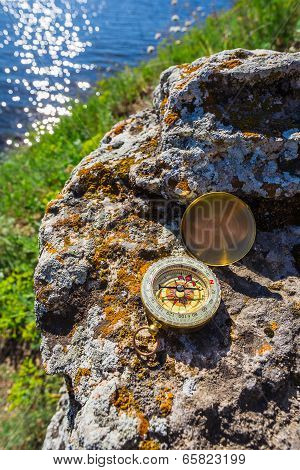 Compass Abandoned On The Rocks