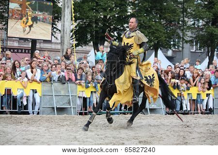 Riga, Latvia - August 21:dan Naporus From The Devils Horsemen Stunt Team Riding Black Horse During R