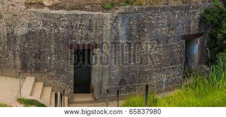 Old Broken German Bunkers Of Atlantic Wall On Pointe-du-hoc. Western End Of The Omaha Beach Sector,
