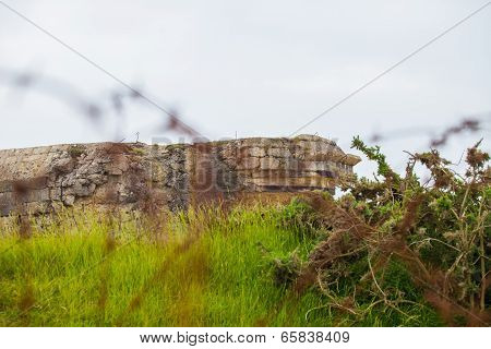 Old Broken German Bunkers Of Atlantic Wall On Pointe-du-hoc. Western End Of The Omaha Beach Sector,
