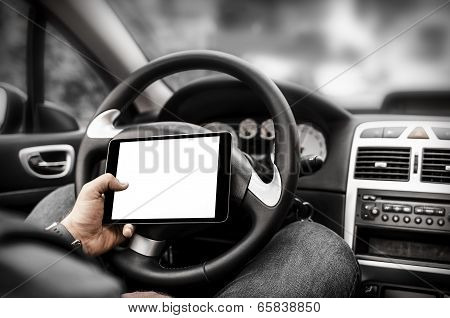 Car Driver With The Tablet Pc