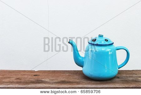 Kettle Old Blue On The  On Wooden Table