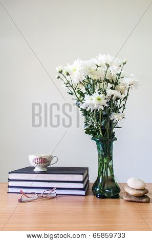 Romantic  A Bouquet Of Chrysanthemum White In Green Glass  Jug With Coffee Cup With Old Book With Gl