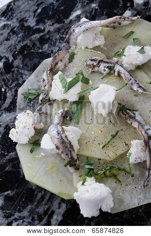 kohlrabi with anchovies and goats cheese
