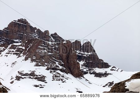 Snow Rocks At Cloudy Day