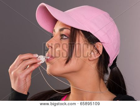 Attractive Brunette Female Blows Whistle Pink Ball Cap Whistleblower