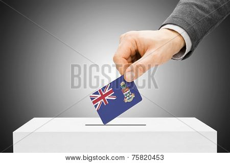 Voting Concept - Male Inserting Flag Into Ballot Box - Cayman Islands