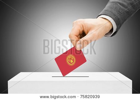 Voting Concept - Male Inserting Flag Into Ballot Box - Kyrgyzstan