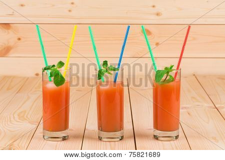 Grapefruit juice on table.