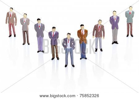 Business Figurine in V-Formation Hierarchy