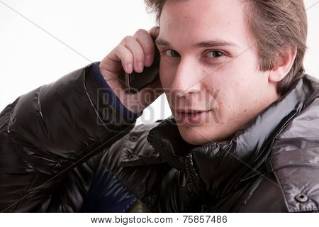 Young Man Phoning On A Mobile Phone