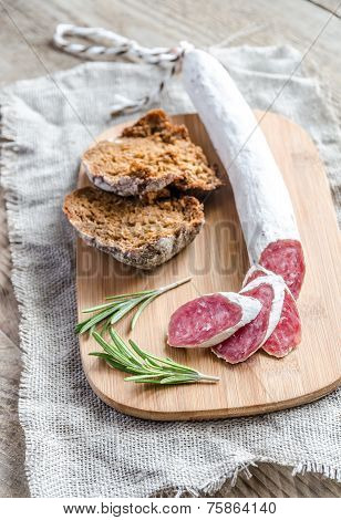 Slices Of Spanish Salami On The Sackcloth