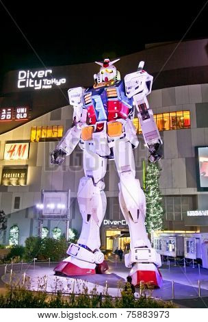 ODAIBA,TOKYO-OCTOBER 28, 2014: This is a replica of titular japanese robot anime Gundam. Standing 18m tall in front of Diver City in Tokyo, Japan.