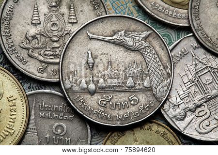 Coins of Thailand. Royal Barge Suphannahong and the Grand Royal Palace in Bangkok depicted in the old Thai five baht coin.