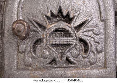 Cast iron door for furnaces.