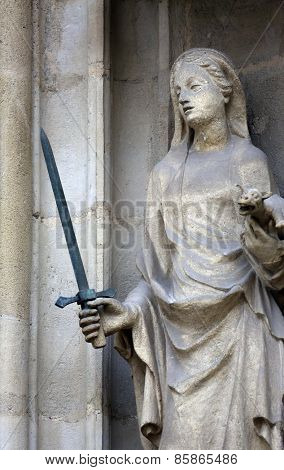 VIENNA, AUSTRIA - OCTOBER 11: Saint Justine of Padua, portal of the Minoriten kirche in Vienna, Austria on October 11, 2014.