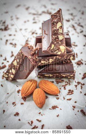 Chocolate With Almonds Nuts Closeup