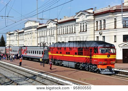 TULA, RUSSIA - MAY 23, 2015: Passenger train on the railroad station Moskovsky. The station building was erected in 1913 and then reconstructed in 1952-1955