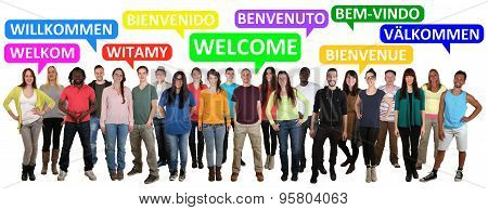 Multi Ethnic Group Of Smiling Young People Saying Welcome