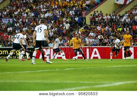 May 27, 2015 - Shah Alam, Malaysia: Malaysia's Indra Putra (13) dribbles the ball into Tottenham Hotspur's territory in a friendly match in Malaysia. Tottenham Hotspur is on a Asia-Australia tour.