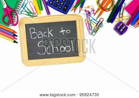Back To School chalkboard with school supplies border