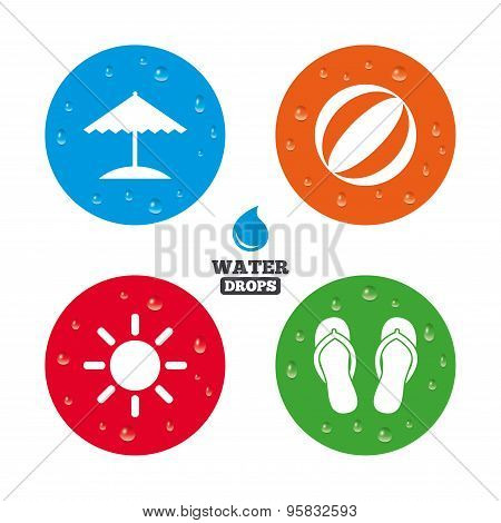 Beach holidays icons. Umbrella and sandals.