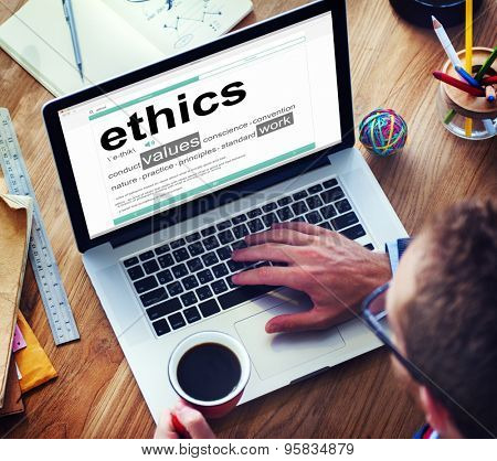 Man Reading the Definition of Ethics