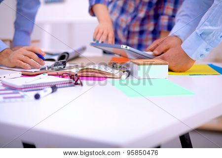 Young business people working at office on new project