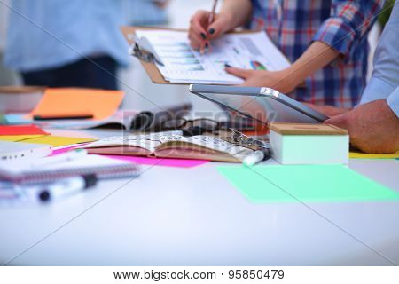 Young business people working at office on new project