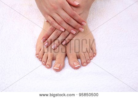 Beautiful feet with perfect spa french nail pedicure
