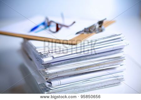 Big stack of papers ,documents on the desk