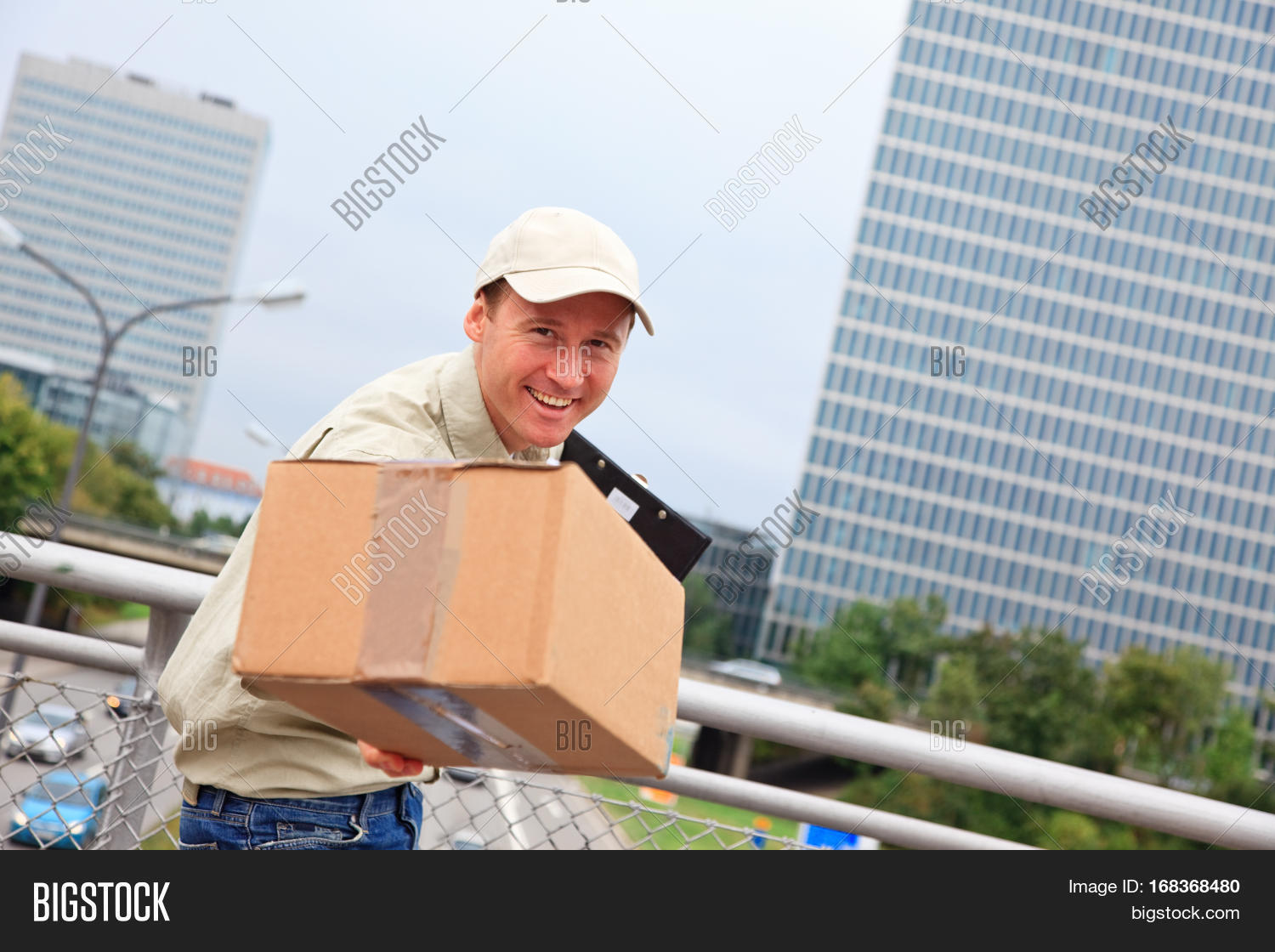 Tall City Delivery >> Smiling Delivery Image Photo Free Trial Bigstock Tall City Delivery >> Smiling Delivery Image Photo Free Trial Bigstock