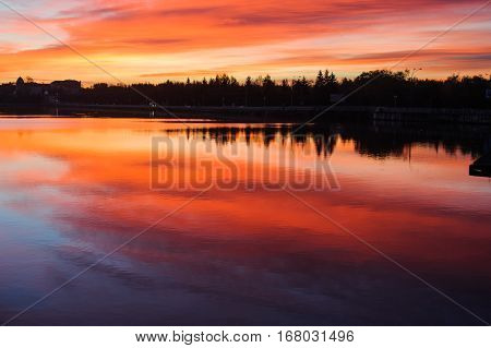 Beautiful romantic sunset over a calm lake