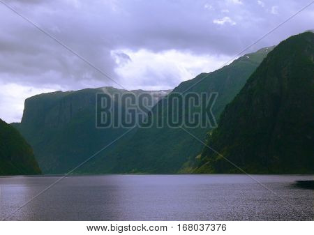 Dramatic clouds over the spectacular fjord Aurlandsfjorden, near Bergen, Norway.