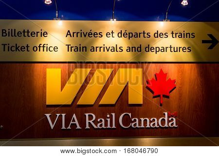 QUEBEC CITY, DECEMBER 27, 2016: Via Rail Canada departures board in Quebec City Palais Royal train station. Via Rail Canad is the main rail passenger carrier in Canada.