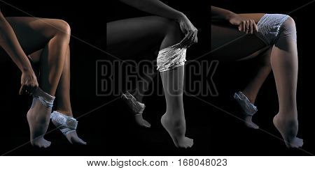 Low key photo triptych of sexy woman put on her white nylon stockings on long fit legs against dark background