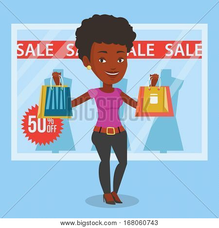 African woman with shopping bags standing in front of clothes shop with sale sign. Woman holding shopping bags in front of storefront with text sale. Vector flat design illustration. Square layout.
