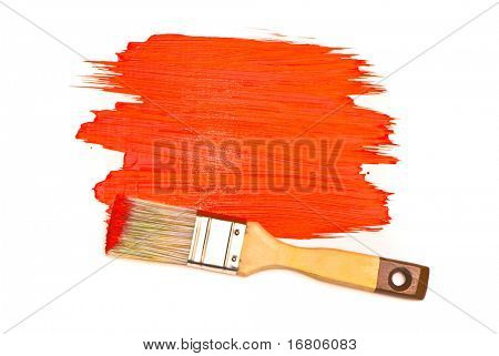 Red paint and brush on white studio