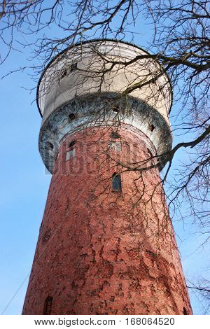 Old former german water tower in the Polessk (Labiau) Kaliningrad region. Russia. The tower was built in 1907.