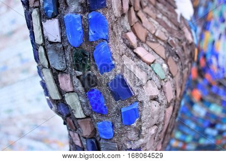 Colorful pattern of geometric mosaic old wall from smalt.