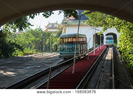 Kanchanaburi, Thailand - December 10, 2016: The popular Tram as he arrives at Wat Thum Sua - Tiger Cave Templ on December 10, 2016 in Kanchanaburi, Thailand