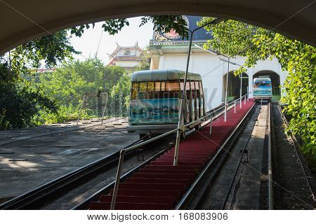 Kanchanaburi, Thailand - December 10, 2016: The popular Tram as he arrives at Wat Thum Sua - Tiger Cave Templ on December 10, 2016 in Kanchanaburi, Thailand
